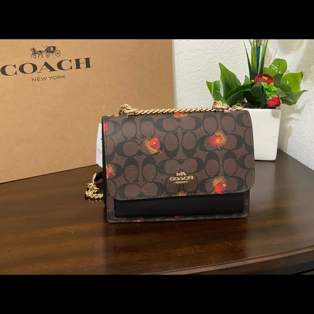 Coach  Klare Signature Coated Small Poppy Flora. AUTHENTICITY GUARANTEE